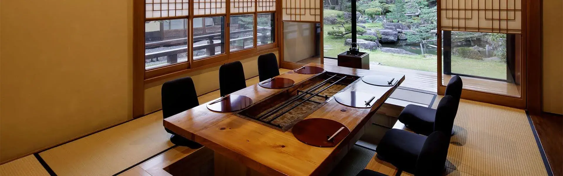 Irori dining hall with garden view at Tsuruga Higashiyama Sohonzan, Aizuwakamatsu
