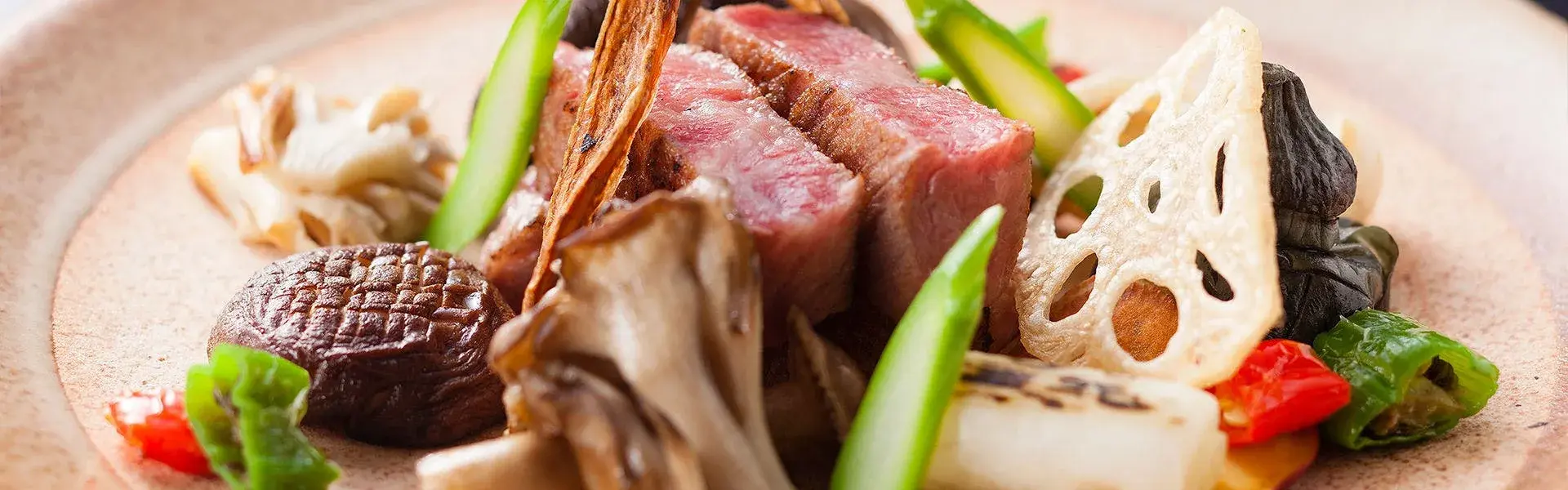 Grilled beef with maitake mushrooms and lotus root, kaiseki dinner course