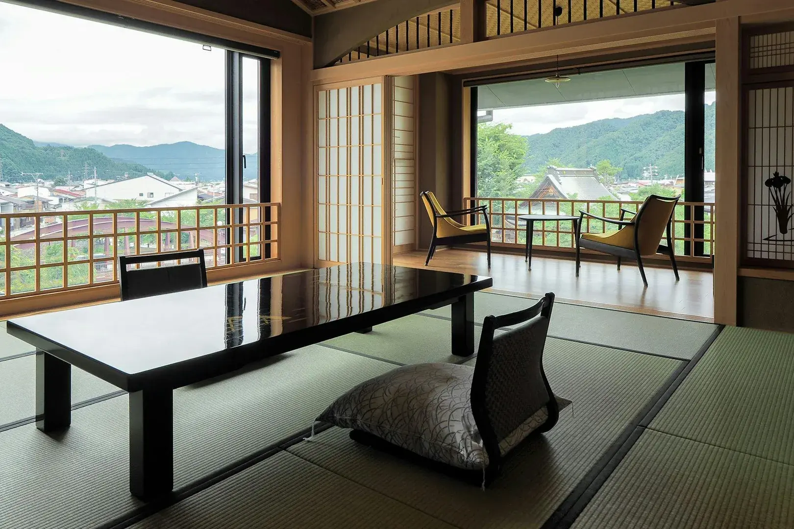Tatami room with Hida mountain panorama at Yatsusankan in Furukawa