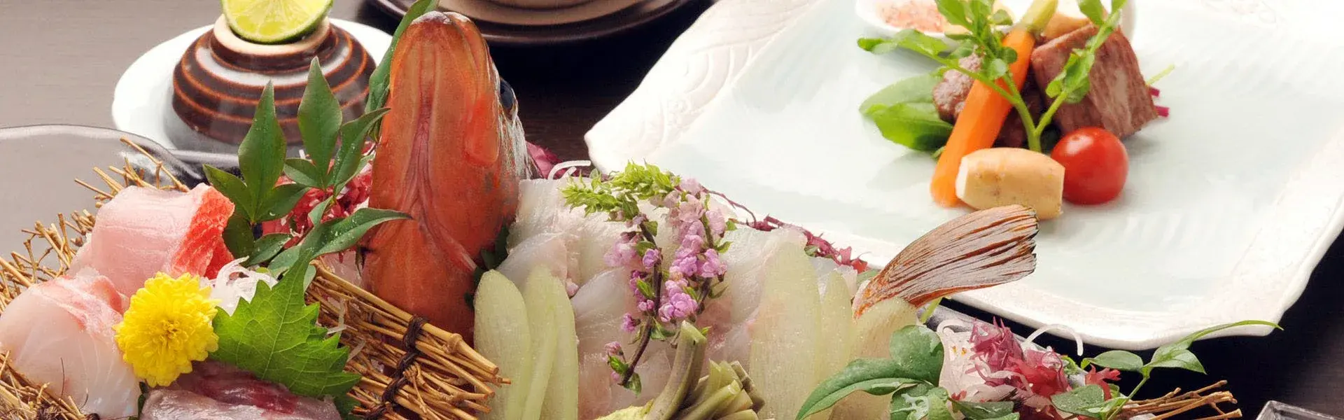 Kaiseki sashimi course with seasonal seafood and edible flowers