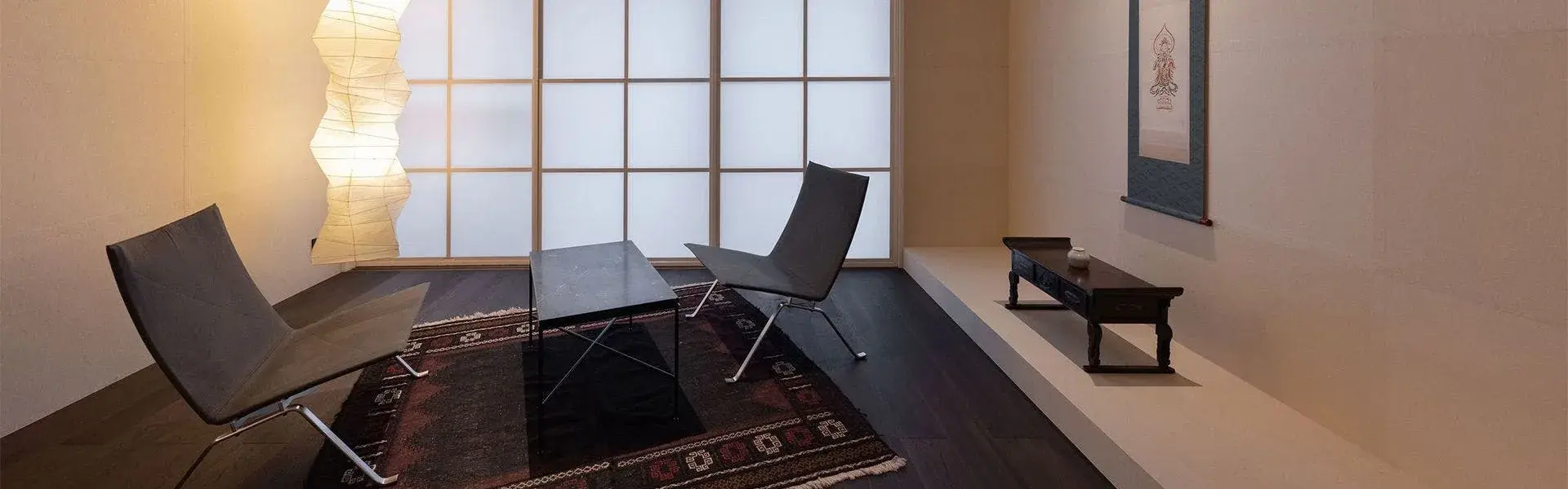 Rakudo An's paper room with Hatano Wataru washi lamp and low lounge chairs