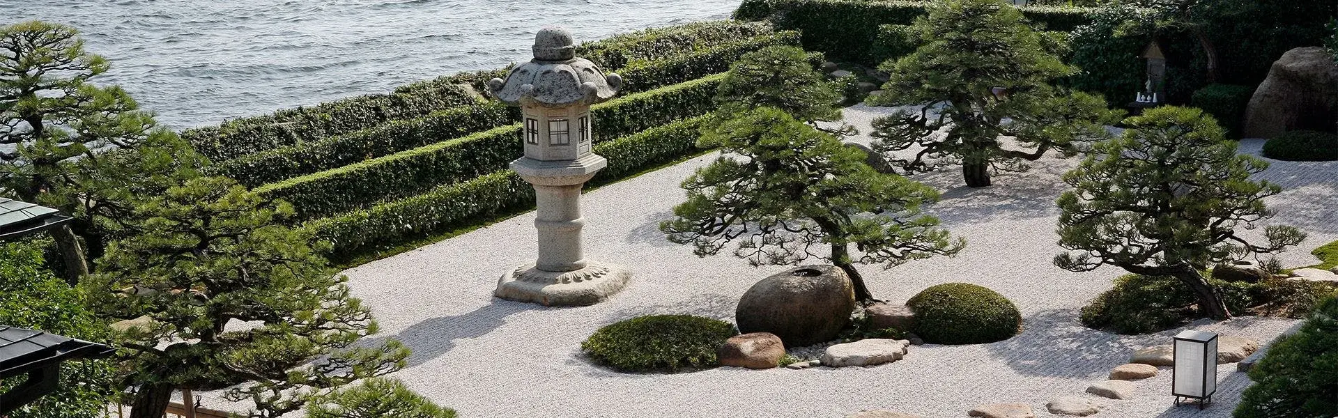 Minamikan's raked gravel garden and stone lantern above Lake Shinji in Matsue