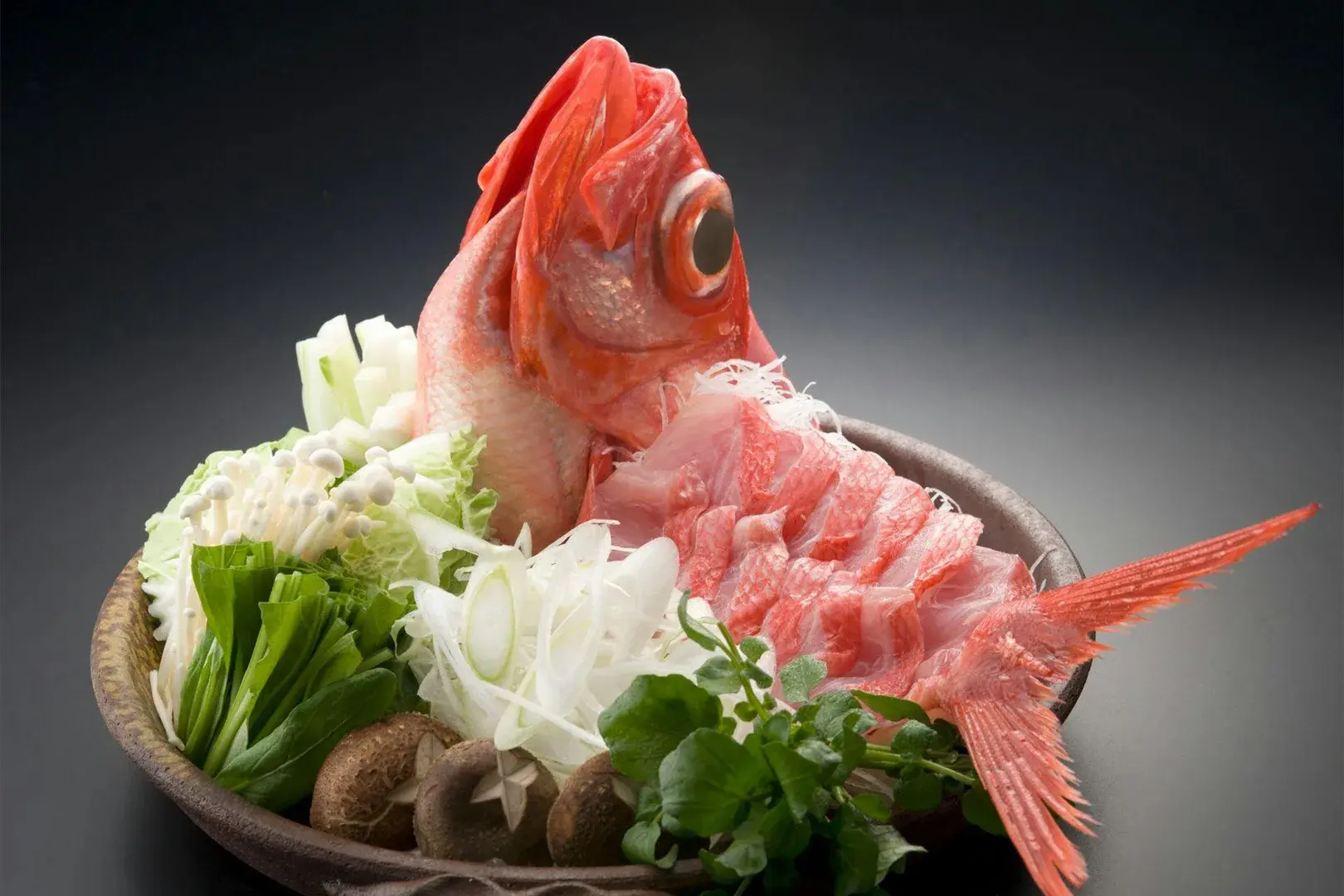 Whole kinmedai prepared for nabe at Izu no Hana, with enoki and napa cabbage