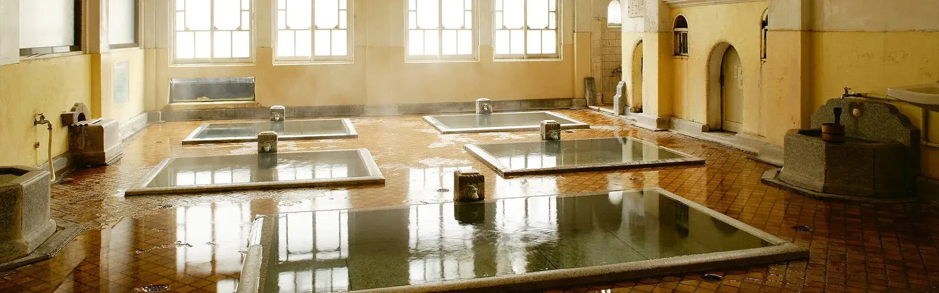 Steaming pools inside Sekizenkan's 1930 Taisho Romanesque Genroku no Yu bathhouse