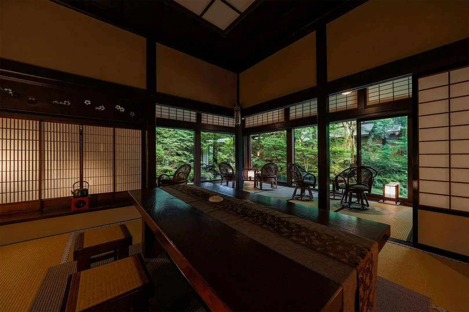 Tatami room at Chousenkaku Kameya with engawa and forest garden view