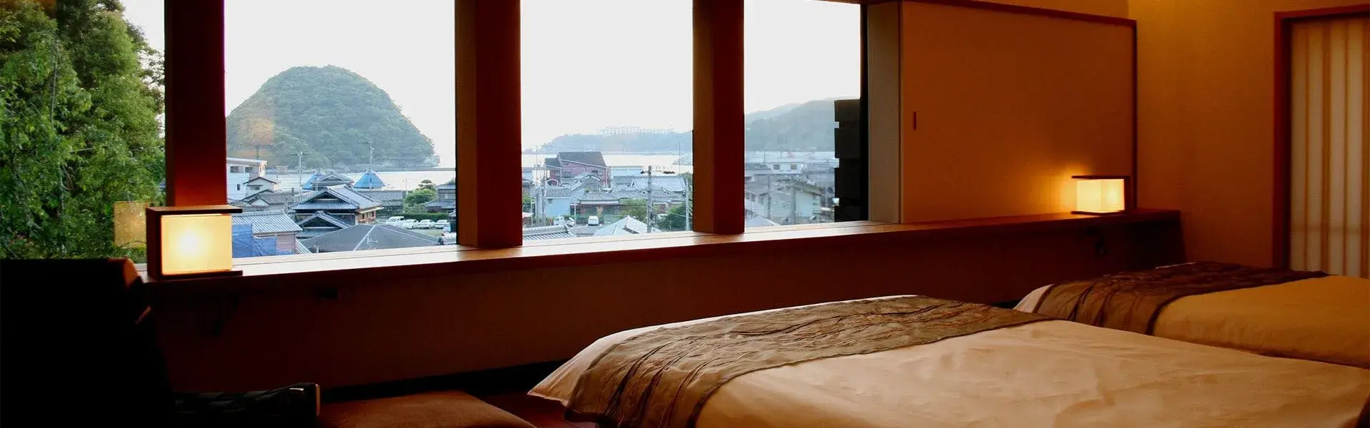 Bedroom suite at Akiba Nanikyuan overlooking Susami Bay and the island beyond